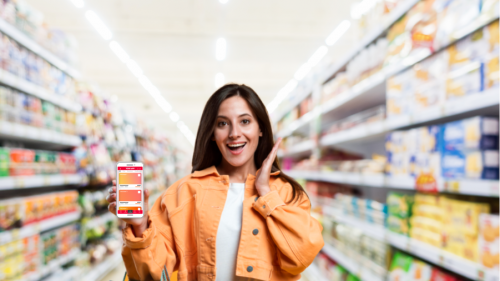 woman-holding-a-phone-inside-a-supermarket